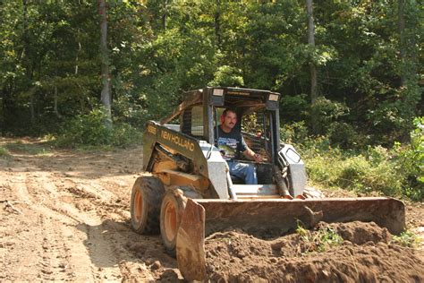 building a pond with a skid steer|2.5 acre pond build.